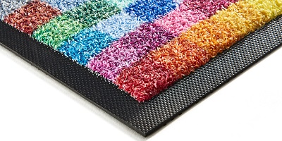Differenza tra tappeto intarsiato e asciugapassi stampato
